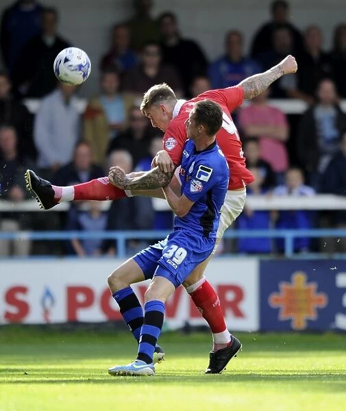 Aden Flint Clears Ball under Pressure: Rochdale vs. Bristol City, Sky Bet League One