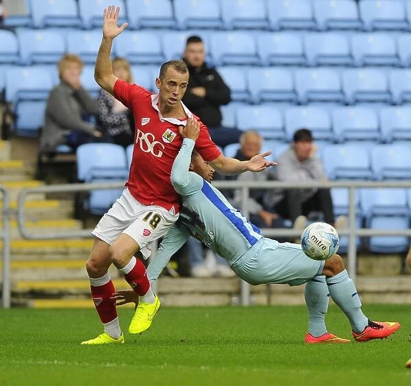 Battling for Supremacy: Wilbraham vs. Clarke in the Sky Bet League One Clash between Bristol City and Coventry City