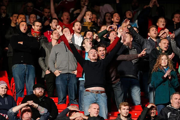 Bristol City Fans Watch Tense Moments at Barnsley's Oakwell Stadium, 2014