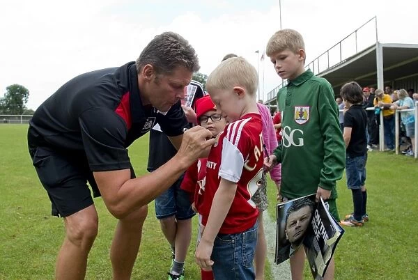 Bristol City FC: Steve Cotterill Engages with Young Fans at Pre-Season Training Session