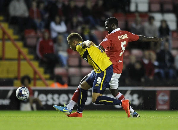 Bristol City vs Oxford United: Karleigh Osborne Tackles Carlton Morris in First Round Capital One Cup Clash