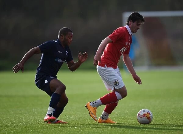 Bristol City's Jack Batten Chased by Jermaine Easter of Millwall - Football Rivalry Intensifies