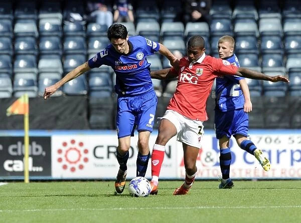 Bristol City's Mark Little and Rochdale's Peter Vincenti Battle for Ball Possession in Sky Bet League One Clash