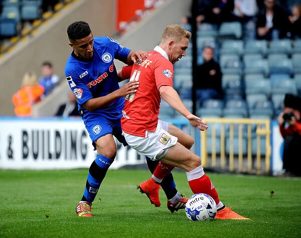 Bristol City's Scott Wagstaff Secures Ball Possession Against Rochdale's Bastien Hery