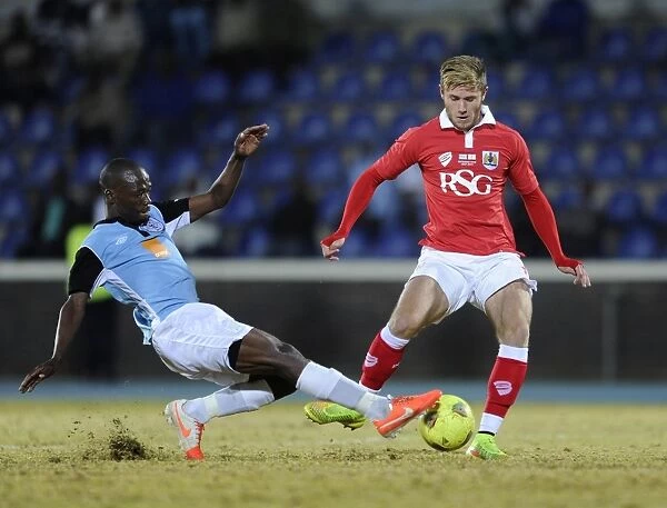 Bristol City's Wes Burns Tackled During Botswana Tour Match