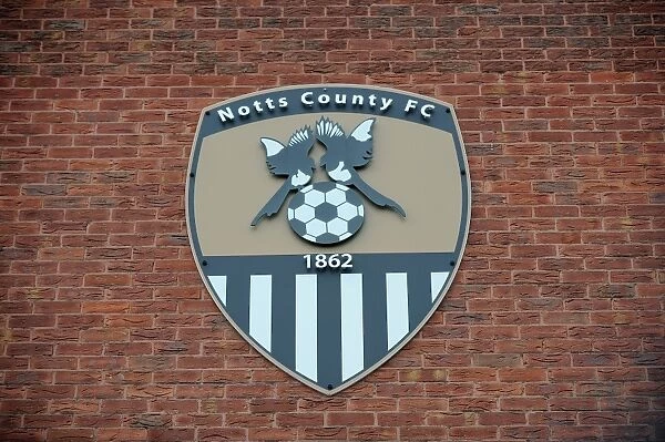 Football Rivalry at Meadow Lane: Notts County vs. Bristol City (August 2014) - Brick Wall Showcases Notts County Crest