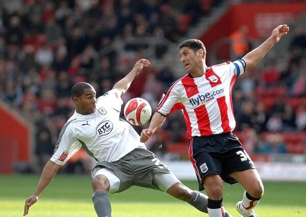 Intense Battle: Marvin Elliott Fights for Possession in Southampton vs. Bristol City