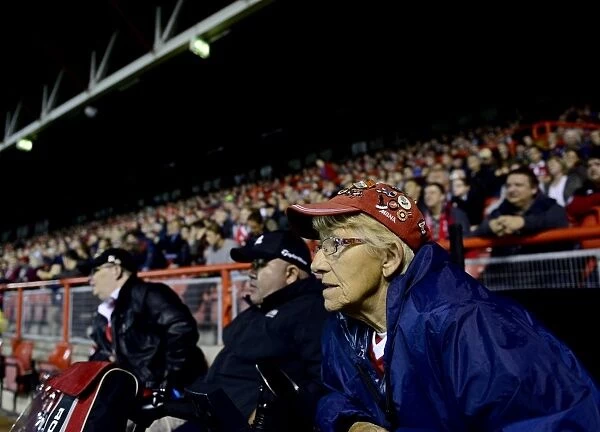 Intense Focus: A Bristol City Fan Caught in the Moment at Ashton Gate