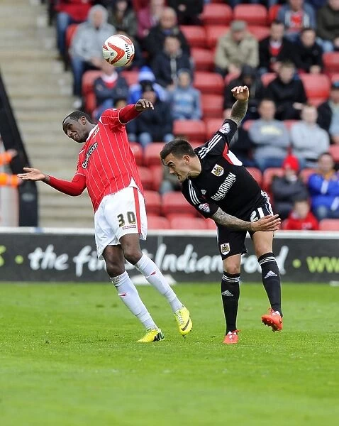 Maron Pack vs Michael Ngoo: Aerial Battle in Walsall vs Bristol City Football Match, League One, 2014