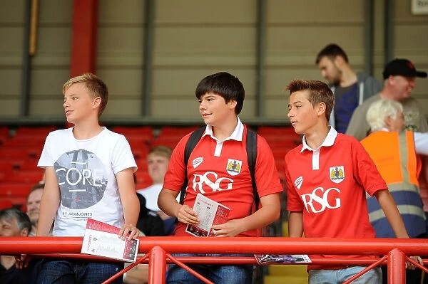 A Sea of Passion: Bristol City Fans in Full Swing at Ashton Gate during Sky Bet League One Match vs Colchester United