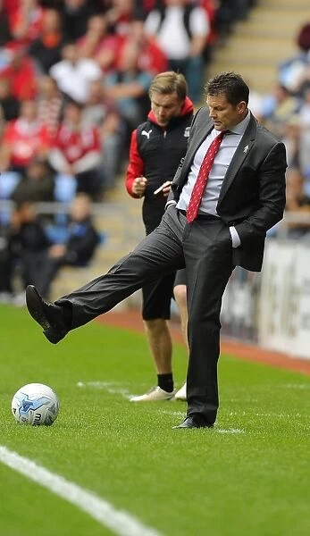 Steve Cotterill's Intense Moment: Kicking the Ball in Sky Bet League One Clash between Coventry City and Bristol City (October 18, 2014)