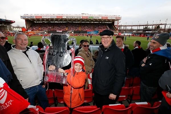Young Bristol City Fan with Cardboard FA Cup at Ashton Gate Stadium before Bristol City vs West Ham United, FA Cup Fourth Round
