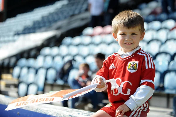 Young Bristol City Fan's Excitement at Rochdale AFC's Spotland Stadium