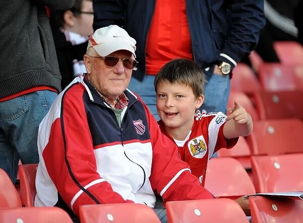 Young Fan Points at Ashton Gate Pitch during Bristol City vs Notts County Match, 2014