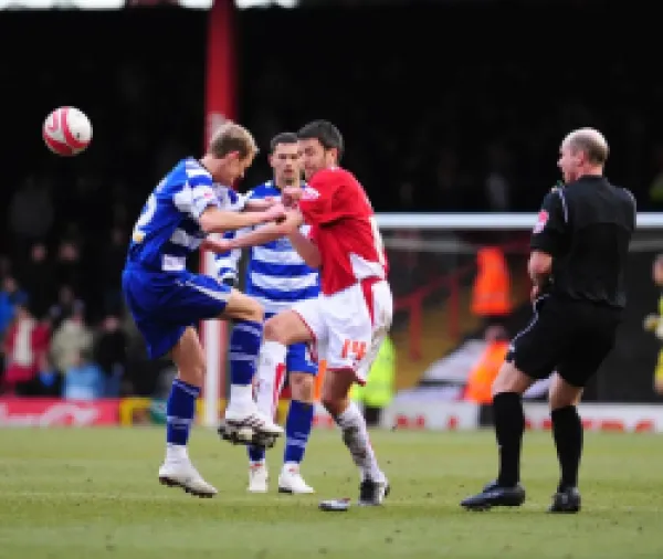 Buy Cole Skuse battles with Dean Shiels