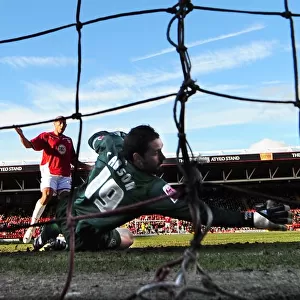 Lee Johnson's Euphoric Moment: Celebrating the Second Goal Against Scott Carson and West Bromwich Albion in Bristol City's Championship Victory (February 21, 2010)