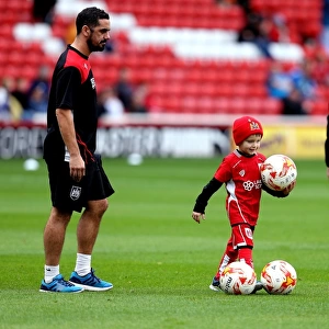 Young Bristol City Fan Invited onto Oakwell Pitch to Help Collect Footballs for Warm-Up