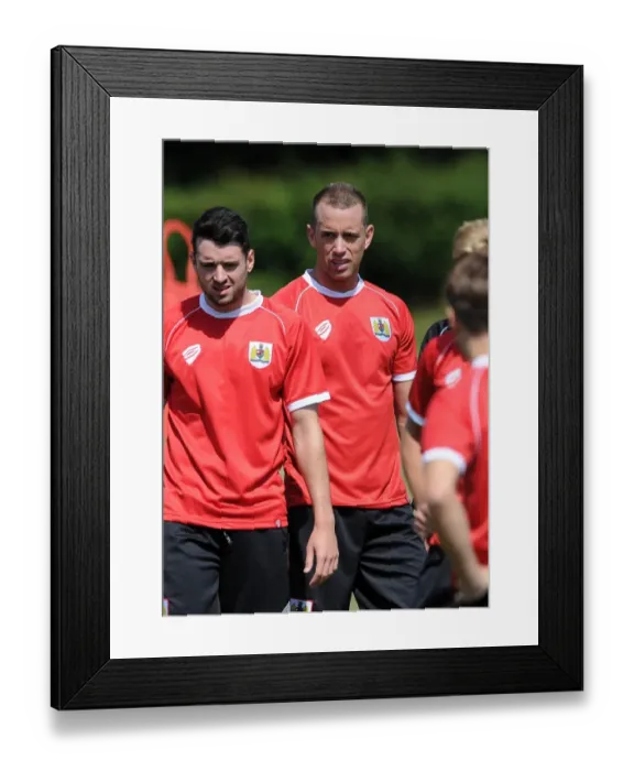 Framed Print : Bristol City Football Training: Wilbraham and Moloney in Action (July 2014) Framed Print : Bristol City Football Training: Wilbraham and Moloney in Action (July 2014)