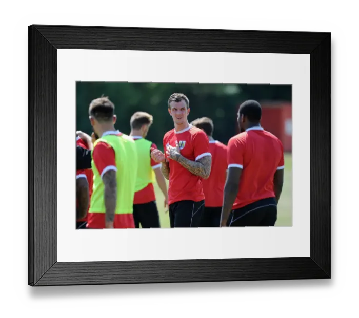 Framed Print : Aden Flint's Unwavering Concentration at Bristol City Football Training (July 2, 2014) Framed Print : Aden Flint's Unwavering Concentration at Bristol City Football Training (July 2, 2014)