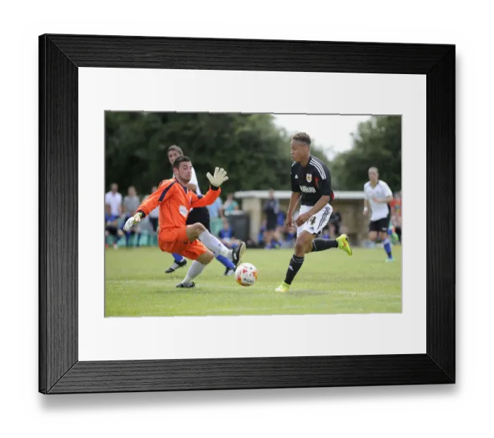 Framed Print : Bobby Reid Scores Past Portishead's Gribble: Portishead Town vs. Bristol City Pre-Season Friendly
