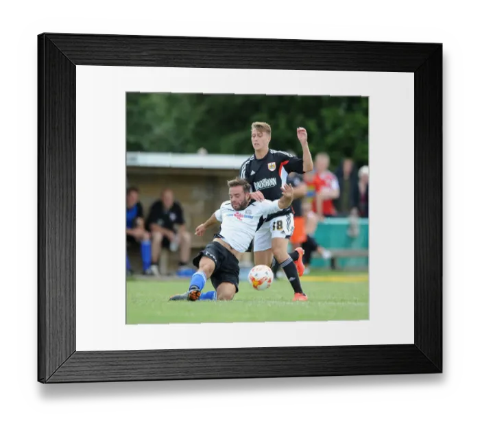 Framed Print : Luke Freeman vs. Nicky Lawrence: A Pre-Season Battle at The Playing Fields - Portishead Town vs. Bristol City Framed Print : Luke Freeman vs. Nicky Lawrence: A Pre-Season Battle at The Playing Fields - Portishead Town vs. Bristol City