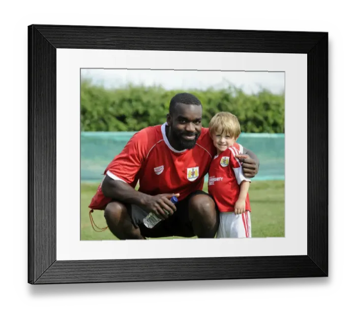Framed Print : Bristol City's Karleigh Osborne and Young Fan Share a Moment at Portishead Town's The Playing Fields