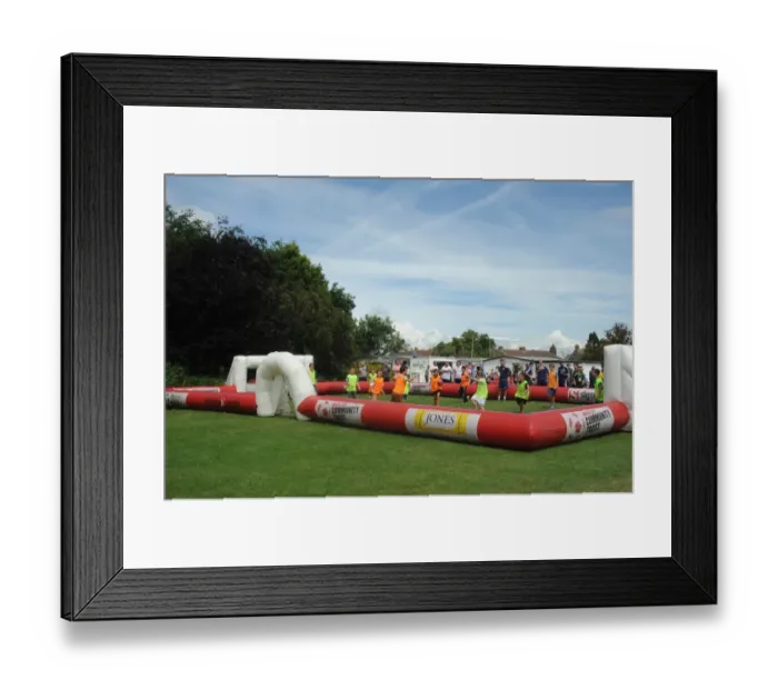 Framed Print : Young Fans Play Football on Inflatable Pitch Before Portishead Town vs. Bristol City Match Framed Print : Young Fans Play Football on Inflatable Pitch Before Portishead Town vs. Bristol City Match