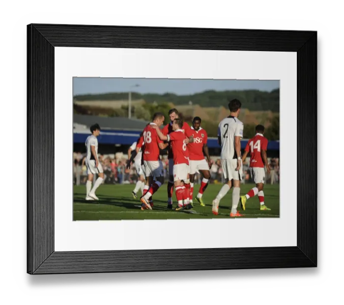 Framed Print : Bristol City's Aaron Wilbraham Scores and Celebrates with Team Mates Against Weston Super Mare, July 2014 Framed Print : Bristol City's Aaron Wilbraham Scores and Celebrates with Team Mates Against Weston Super Mare, July 2014