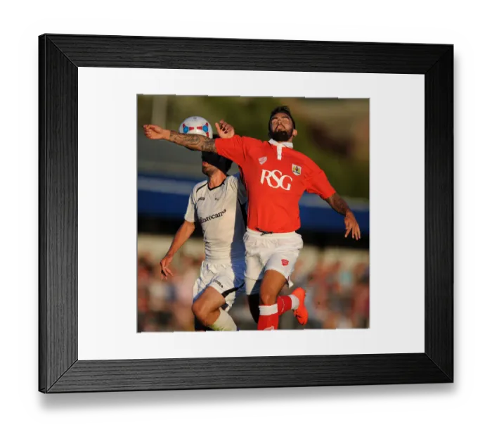 Framed Print : Marlon Pack Tackles in Pre-Season Friendly: Weston Super Mare vs. Bristol City, 2014