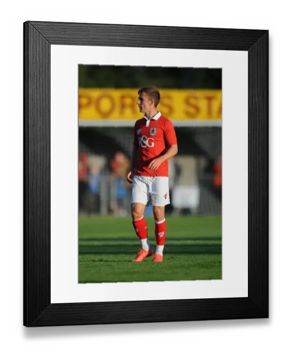 Framed Print : Bristol City's Joe Bryan in Pre-Season Action at Weston Super Mare's Woodspring Stadium (09 / 07 / 2014)