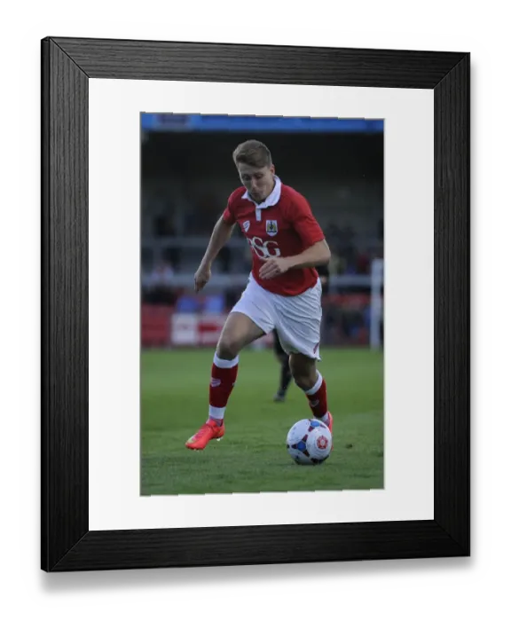 Framed Print : Bristol City's Luke Freeman Celebrates Pre-Season Win with Trophy at Woodspring Stadium Framed Print : Bristol City's Luke Freeman Celebrates Pre-Season Win with Trophy at Woodspring Stadium