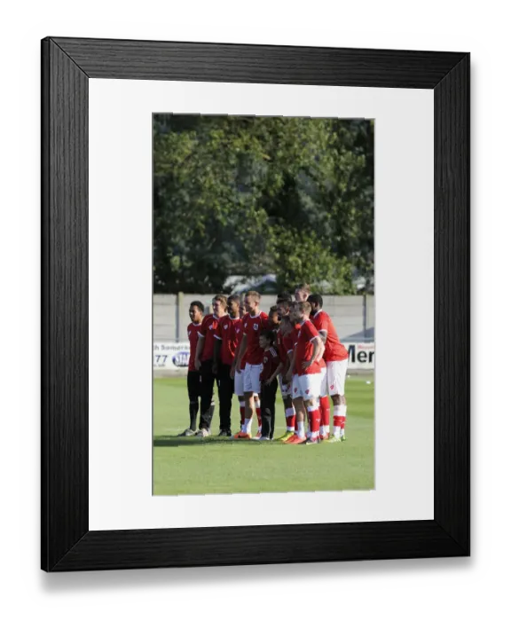 Framed Print : Young Fan Meets Bristol City Squad at Weston Super Mare's Woodspring Stadium Framed Print : Young Fan Meets Bristol City Squad at Weston Super Mare's Woodspring Stadium