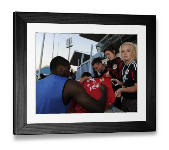 Framed Print : Jay Emmanuel-Thomas of Bristol City Signs Autographs for Fans During Extension Gunners Match, 2014