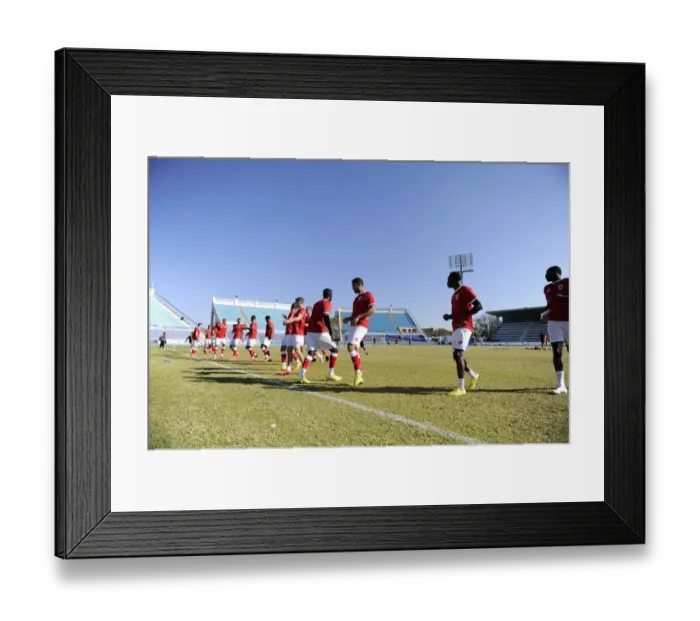 Framed Print : Bristol City FC Players Gear Up for Extension Gunners Clash in Botswana: Warm-Up at National Stadium Framed Print : Bristol City FC Players Gear Up for Extension Gunners Clash in Botswana: Warm-Up at National Stadium