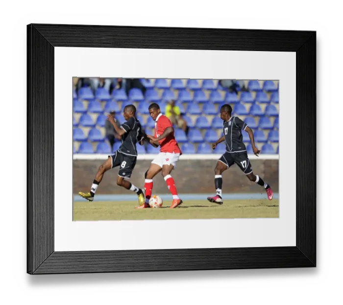 Framed Print : Mark Little Faces Off Against Mosimanegape Ntwanetsi in Extension Gunners vs. Bristol City Clash