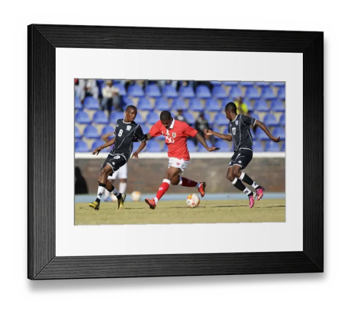 Framed Print : Mark Little vs. Mosimanegape Ntwanetsi: A Football Showdown at Extension Gunners Framed Print : Mark Little vs. Mosimanegape Ntwanetsi: A Football Showdown at Extension Gunners