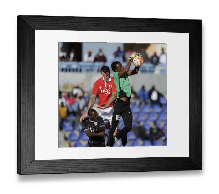 Framed Print : Aden Flint of Bristol City in Action Against Extension Gunners in Botswana, 2014