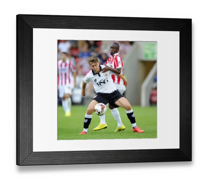 Framed Print : Bristol City's Luke Freeman vs. Omari Sterling-James: A Tight Midfield Battle (2014) Framed Print : Bristol City's Luke Freeman vs. Omari Sterling-James: A Tight Midfield Battle (2014)