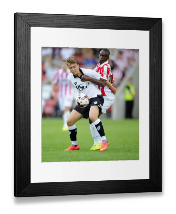 Framed Print : Freeman vs. Sterling-James: A Fierce Rivalry Emerges in the Pre-Season Friendly between Bristol City and Cheltenham Town (July 2014)
