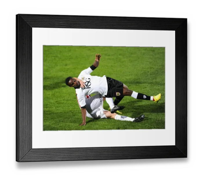 Framed Print : Bristol City's Jordan Wynter Fouled by Cheltenham Town's Jason Taylor during Pre-Season Friendly Framed Print : Bristol City's Jordan Wynter Fouled by Cheltenham Town's Jason Taylor during Pre-Season Friendly