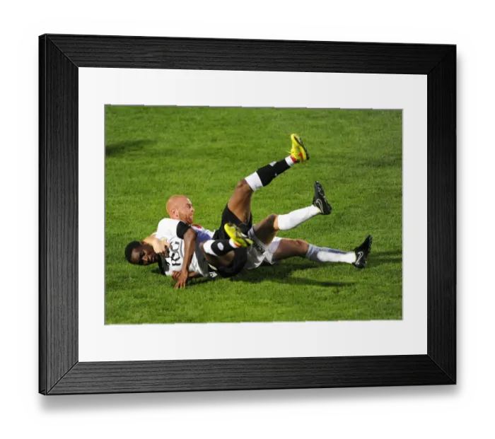 Framed Print : Jordan Wynter Fouls by Jason Taylor in Cheltenham Town vs. Bristol City Pre-Season Friendly