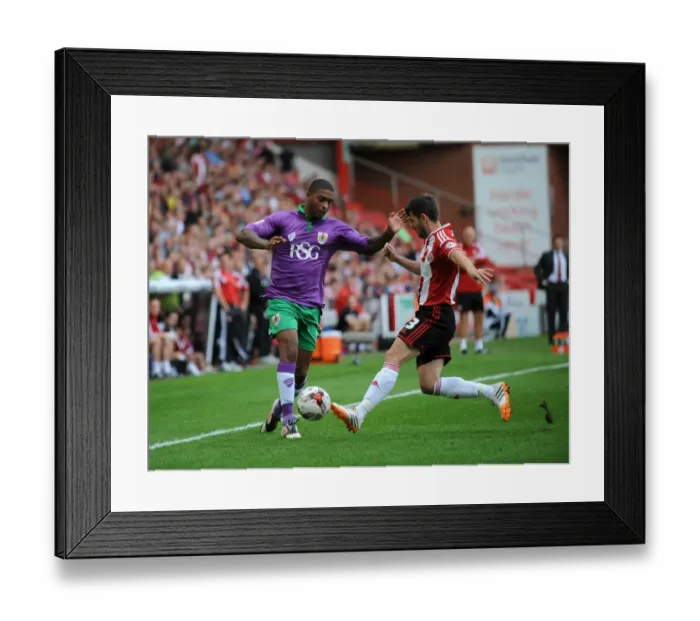 Framed Print : Mark Little vs Robert Harris: Intense Battle in Sheffield United vs Bristol City Football Match, Sky Bet League One Opening Game (09 / 08 / 2014)