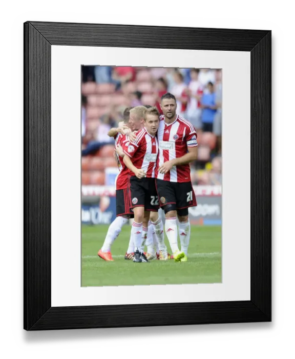 Framed Print : Thrilling Goal Celebration: Michael Higdon Scores the Opener for Bristol City in Sky Bet League One Debut Against Sheffield United (2014)