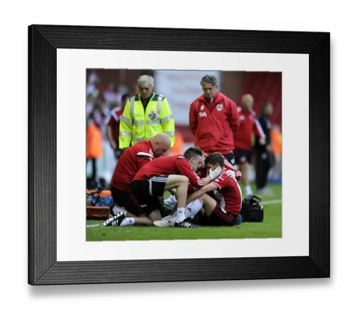 Framed Print : Sky Bet League One: Injured Robert Harris Receives On-Pitch Treatment in Sheffield United vs. Bristol City Opener Framed Print : Sky Bet League One: Injured Robert Harris Receives On-Pitch Treatment in Sheffield United vs. Bristol City Opener
