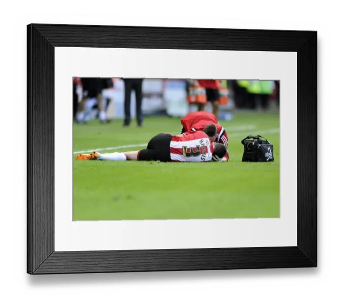 Framed Print : Injured Robert Harris Receives Medical Attention on Pitch: Sheffield United vs. Bristol City, Sky Bet League One Framed Print : Injured Robert Harris Receives Medical Attention on Pitch: Sheffield United vs. Bristol City, Sky Bet League One