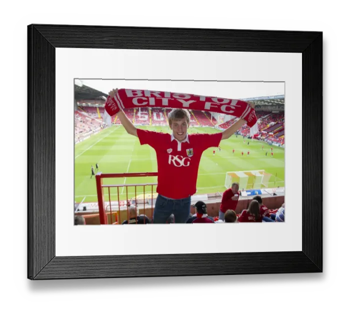 Framed Print : Bristol City Fan Waves Scarf at Sheffield United's Bramal Lane in League One Opener Framed Print : Bristol City Fan Waves Scarf at Sheffield United's Bramal Lane in League One Opener