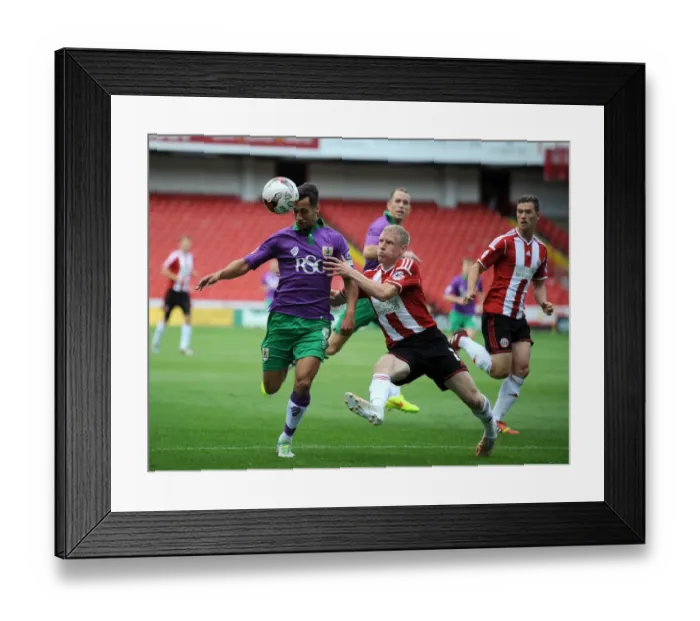 Framed Print : Bristol City's Sam Baldock Faces Off Against Sheffield United's Craig Alcock in League One Opener Framed Print : Bristol City's Sam Baldock Faces Off Against Sheffield United's Craig Alcock in League One Opener