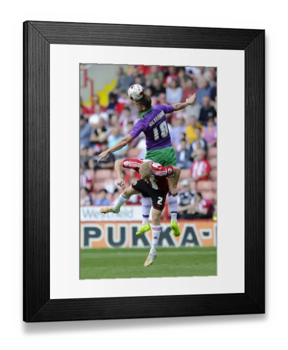 Framed Print : Aaron Wilbraham Outmuscles Craig Alcock: Thrilling Header Clash in Sheffield United vs. Bristol City's League One Opener Framed Print : Aaron Wilbraham Outmuscles Craig Alcock: Thrilling Header Clash in Sheffield United vs. Bristol City's League One Opener