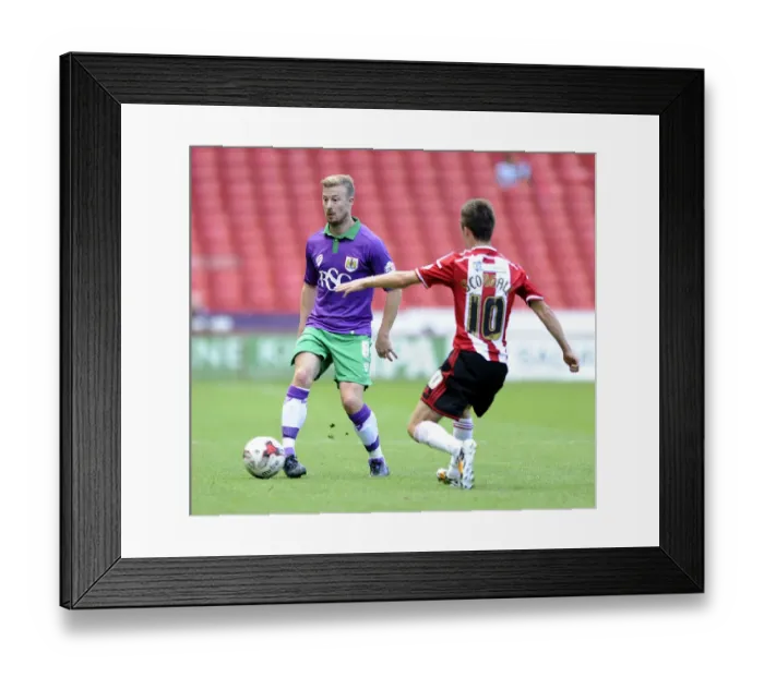 Framed Print : Bristol City's Wade Elliott in Action: Sky Bet League One Opener vs. Sheffield United, August 2014 Framed Print : Bristol City's Wade Elliott in Action: Sky Bet League One Opener vs. Sheffield United, August 2014