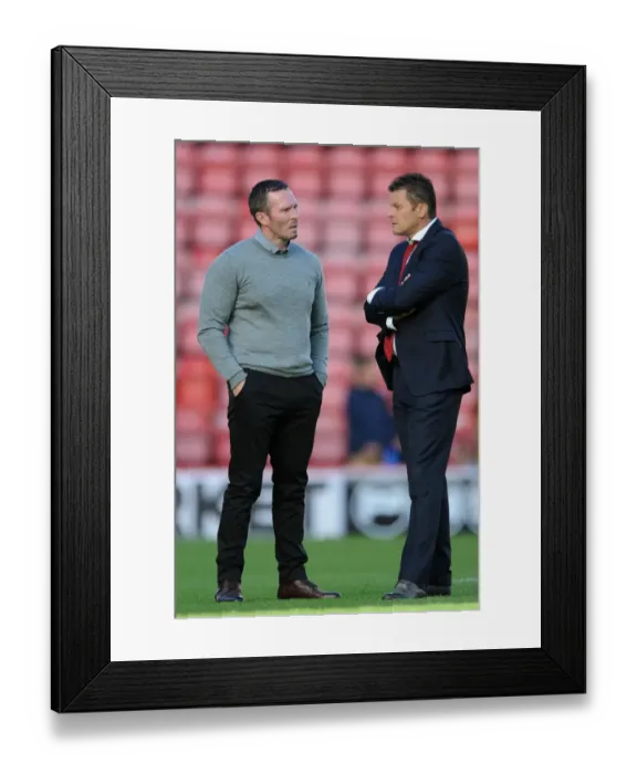 Framed Print : Bristol City vs Oxford United: Pre-Match Conversation Between Managers Steve Cotterill and Michael Appleton Framed Print : Bristol City vs Oxford United: Pre-Match Conversation Between Managers Steve Cotterill and Michael Appleton